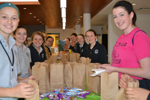 The lacrosse and softball teams make sandwiches for the homeless.
Photo Credit/Katie Pins