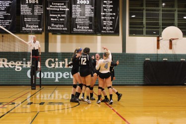 Panthers comes together in the middle of the court.