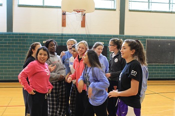 Sophomores strategize their dodge ball game plan. Photo Credit/Ana Lopez