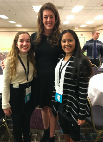 Nina and a friend snap a picture with Allison Schmitt, eight time Olympian medal swimmer and three time Olympian attendee. Photo Courtesy/Nina Menon.