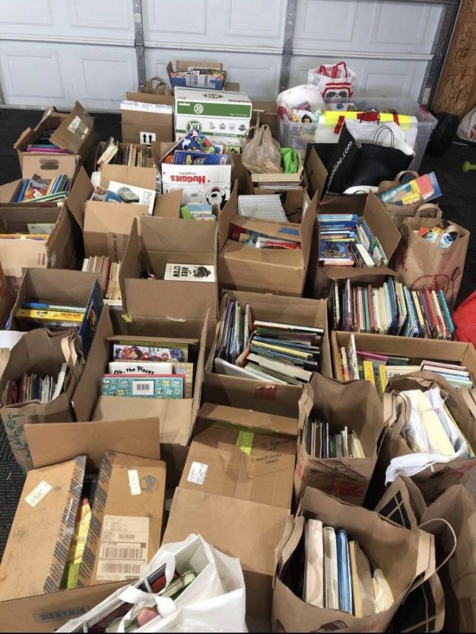 Photo courtesy of Abbey Farmer. Boxes and boxes of books were collected for Jamieson Grade School. 
