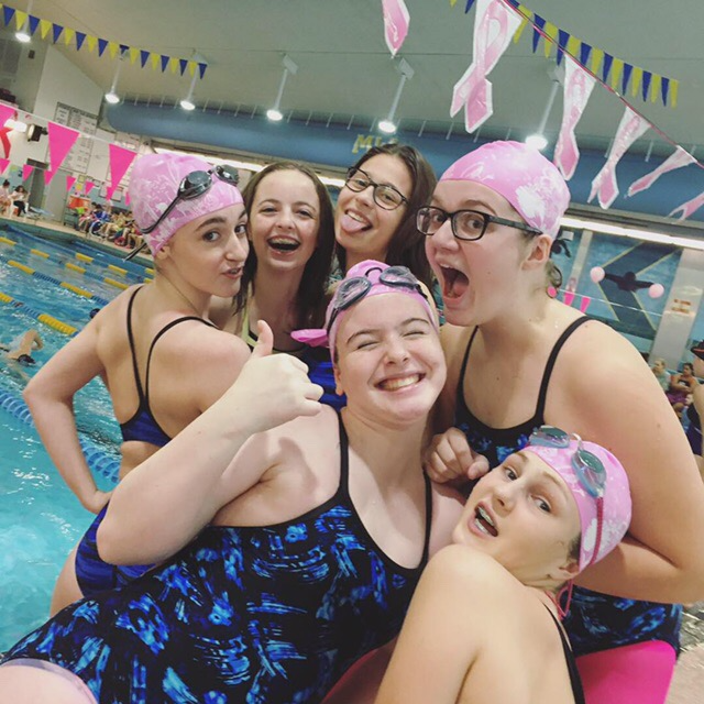 Swimmers dress in pink for Swim for a Cure.