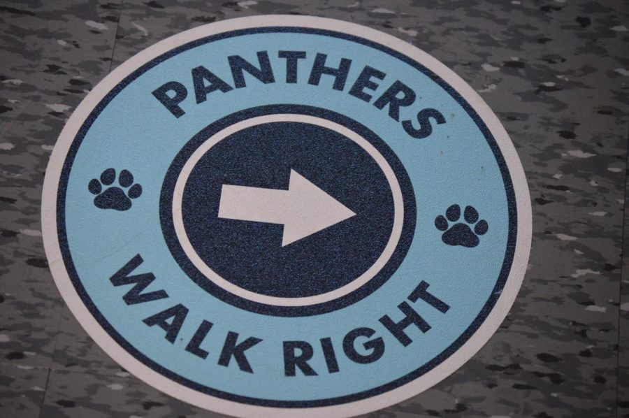 A+Panther+sticker+on+the+ground+to+help+students+keep+social+distancing.+Photo%2FRD+Yearbook+Staff